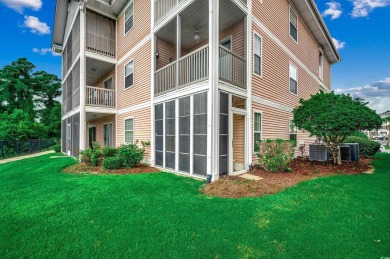 Location! Location! Location! This first-floor, end-unit condo on River Oaks Golf Plantation  in South Carolina - for sale on GolfHomes.com, golf home, golf lot
