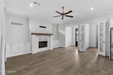 Do not miss this Beautiful white brick home with wonderful on Lake Caroline Golf Club in Mississippi - for sale on GolfHomes.com, golf home, golf lot
