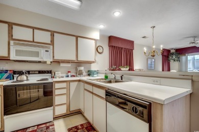 Location! Location! Location! This first-floor, end-unit condo on River Oaks Golf Plantation  in South Carolina - for sale on GolfHomes.com, golf home, golf lot