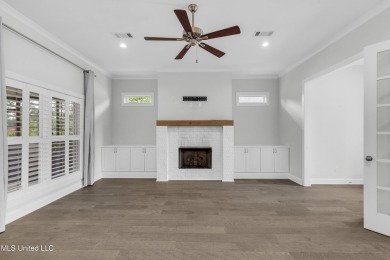 Do not miss this Beautiful white brick home with wonderful on Lake Caroline Golf Club in Mississippi - for sale on GolfHomes.com, golf home, golf lot