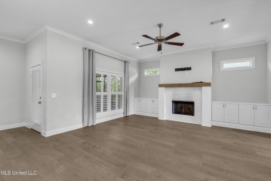 Do not miss this Beautiful white brick home with wonderful on Lake Caroline Golf Club in Mississippi - for sale on GolfHomes.com, golf home, golf lot