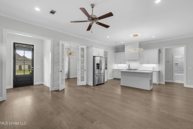 Do not miss this Beautiful white brick home with wonderful on Lake Caroline Golf Club in Mississippi - for sale on GolfHomes.com, golf home, golf lot