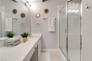 This private second-floor end unit residence is light  bright on Lely Resort Golf and Country Club in Florida - for sale on GolfHomes.com, golf home, golf lot