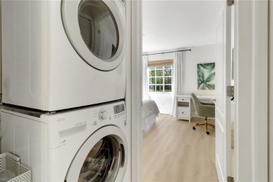 This private second-floor end unit residence is light  bright on Lely Resort Golf and Country Club in Florida - for sale on GolfHomes.com, golf home, golf lot