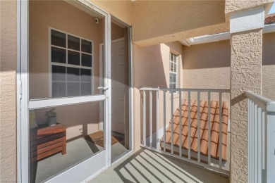 This private second-floor end unit residence is light  bright on Lely Resort Golf and Country Club in Florida - for sale on GolfHomes.com, golf home, golf lot