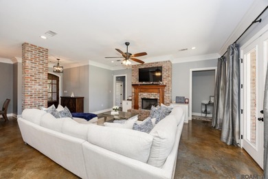 Welcome Home! Situated on a corner lot in the Prestigious Carter on Carter Plantation Golf Course in Louisiana - for sale on GolfHomes.com, golf home, golf lot