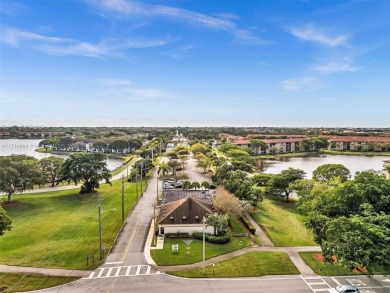 This beautifully remodeled 2/2 second floor unit has a gorgeous on Flamingo Lakes Country Club in Florida - for sale on GolfHomes.com, golf home, golf lot