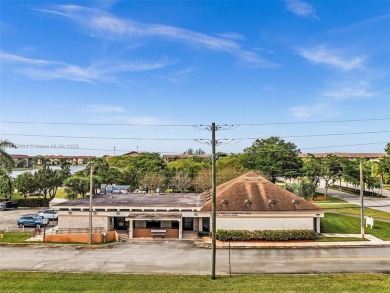 This beautifully remodeled 2/2 second floor unit has a gorgeous on Flamingo Lakes Country Club in Florida - for sale on GolfHomes.com, golf home, golf lot