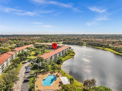 This beautifully remodeled 2/2 second floor unit has a gorgeous on Flamingo Lakes Country Club in Florida - for sale on GolfHomes.com, golf home, golf lot