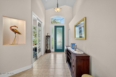 Experience the best of Florida living in this beautifully on Plantation Bay Golf and Country Club in Florida - for sale on GolfHomes.com, golf home, golf lot