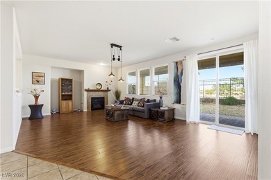 Welcome to this refined two-story residence in the southwest on Rhodes Ranch Golf Club in Nevada - for sale on GolfHomes.com, golf home, golf lot