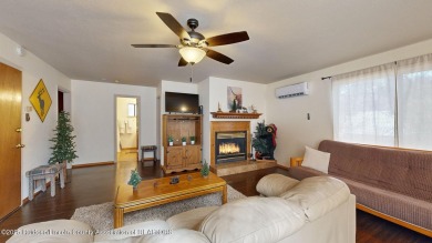 Located in the heart of Ruidoso, this 2-bedroom, 2-bath cabin is on Cree Meadows Country Club in New Mexico - for sale on GolfHomes.com, golf home, golf lot