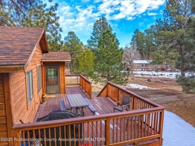 Located in the heart of Ruidoso, this 2-bedroom, 2-bath cabin is on Cree Meadows Country Club in New Mexico - for sale on GolfHomes.com, golf home, golf lot