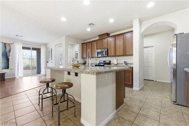 Welcome to this refined two-story residence in the southwest on Rhodes Ranch Golf Club in Nevada - for sale on GolfHomes.com, golf home, golf lot