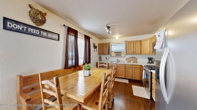 Located in the heart of Ruidoso, this 2-bedroom, 2-bath cabin is on Cree Meadows Country Club in New Mexico - for sale on GolfHomes.com, golf home, golf lot