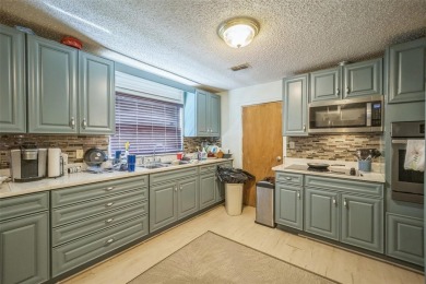 Take advantage of a rare opportunity to own a property in the on Cleveland Heights Golf Course in Florida - for sale on GolfHomes.com, golf home, golf lot