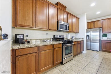 Welcome to this refined two-story residence in the southwest on Rhodes Ranch Golf Club in Nevada - for sale on GolfHomes.com, golf home, golf lot