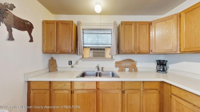 Located in the heart of Ruidoso, this 2-bedroom, 2-bath cabin is on Cree Meadows Country Club in New Mexico - for sale on GolfHomes.com, golf home, golf lot