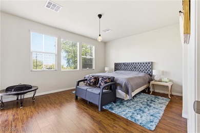 Welcome to this refined two-story residence in the southwest on Rhodes Ranch Golf Club in Nevada - for sale on GolfHomes.com, golf home, golf lot