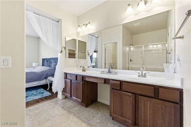 Welcome to this refined two-story residence in the southwest on Rhodes Ranch Golf Club in Nevada - for sale on GolfHomes.com, golf home, golf lot