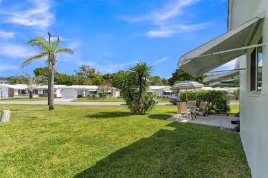 Peace of mind comes built- in with this beautifully maintained on Leisureville Community Association in Florida - for sale on GolfHomes.com, golf home, golf lot