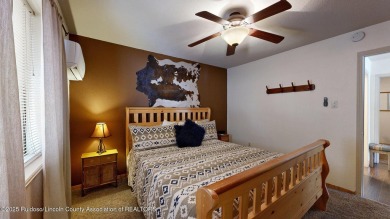 Located in the heart of Ruidoso, this 2-bedroom, 2-bath cabin is on Cree Meadows Country Club in New Mexico - for sale on GolfHomes.com, golf home, golf lot