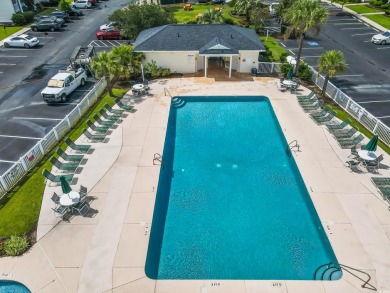 Welcome to this beautifully updated first-floor end-unit on River Oaks Golf Plantation  in South Carolina - for sale on GolfHomes.com, golf home, golf lot