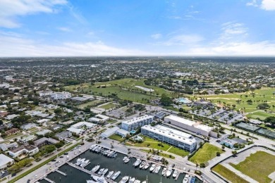 Experience the best of coastal living at 155 Yacht Club Drive on North Palm Beach Country Club in Florida - for sale on GolfHomes.com, golf home, golf lot