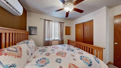 Located in the heart of Ruidoso, this 2-bedroom, 2-bath cabin is on Cree Meadows Country Club in New Mexico - for sale on GolfHomes.com, golf home, golf lot