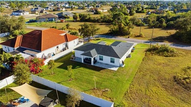 Charming 2024 Cape Coral Gem - No Flood Insurance Required! on Burnt Store Golf Club in Florida - for sale on GolfHomes.com, golf home, golf lot