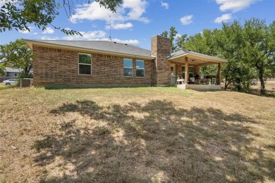 This charming 3 bedroom 2 bath home is nestled in the Holiday on Holiday Hills Country Club in Texas - for sale on GolfHomes.com, golf home, golf lot