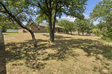 This charming 3 bedroom 2 bath home is nestled in the Holiday on Holiday Hills Country Club in Texas - for sale on GolfHomes.com, golf home, golf lot