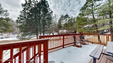 Located in the heart of Ruidoso, this 2-bedroom, 2-bath cabin is on Cree Meadows Country Club in New Mexico - for sale on GolfHomes.com, golf home, golf lot