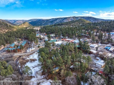 Located in the heart of Ruidoso, this 2-bedroom, 2-bath cabin is on Cree Meadows Country Club in New Mexico - for sale on GolfHomes.com, golf home, golf lot