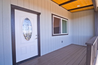 This stunning 3-bedroom, 2.5-bath home sits on the golf course on Discovery Harbour Golf Course in Hawaii - for sale on GolfHomes.com, golf home, golf lot