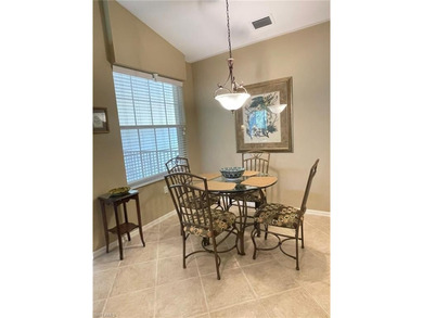 Nestled alongside the Flamingo Island Golf Course, this on Lely Resort Golf and Country Club in Florida - for sale on GolfHomes.com, golf home, golf lot