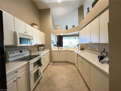 Nestled alongside the Flamingo Island Golf Course, this on Lely Resort Golf and Country Club in Florida - for sale on GolfHomes.com, golf home, golf lot