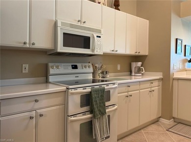 Nestled alongside the Flamingo Island Golf Course, this on Lely Resort Golf and Country Club in Florida - for sale on GolfHomes.com, golf home, golf lot