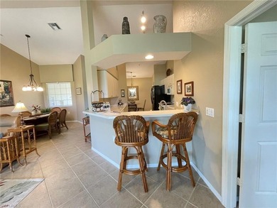 Nestled alongside the Flamingo Island Golf Course, this on Lely Resort Golf and Country Club in Florida - for sale on GolfHomes.com, golf home, golf lot