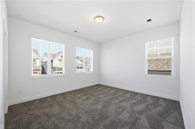 et on a beautifully positioned corner homesite, this nearly new on City Club Marietta in Georgia - for sale on GolfHomes.com, golf home, golf lot