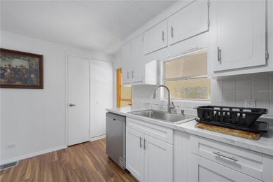 Welcome to 430 Queensway Rd East in award winning Maple Leaf on Maple Leaf Golf and Country Club in Florida - for sale on GolfHomes.com, golf home, golf lot