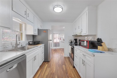 Welcome to 430 Queensway Rd East in award winning Maple Leaf on Maple Leaf Golf and Country Club in Florida - for sale on GolfHomes.com, golf home, golf lot