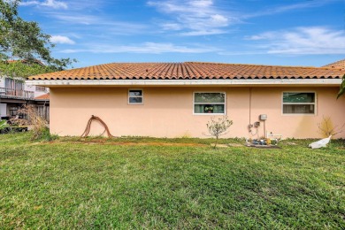 This beautifully updated 3-bedroom, 2-bathroom villa offers the on Yacht and Country Club in Florida - for sale on GolfHomes.com, golf home, golf lot