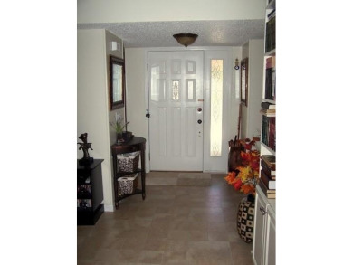 Welcome to this charming 2-bedroom, 2-bath home with a 2-car on Bella Vista - Metfield Golf Complex and Country Club in Arkansas - for sale on GolfHomes.com, golf home, golf lot