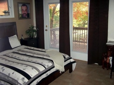 Welcome to this charming 2-bedroom, 2-bath home with a 2-car on Bella Vista - Metfield Golf Complex and Country Club in Arkansas - for sale on GolfHomes.com, golf home, golf lot