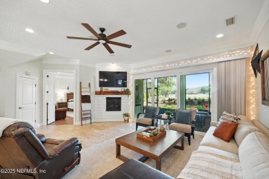 Nestled beneath a canopy of mature oak trees in the gated on Queens Harbour Yacht and Country Club in Florida - for sale on GolfHomes.com, golf home, golf lot