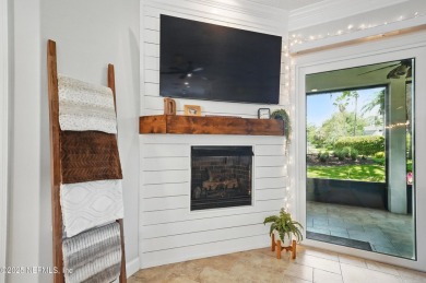 Nestled beneath a canopy of mature oak trees in the gated on Queens Harbour Yacht and Country Club in Florida - for sale on GolfHomes.com, golf home, golf lot