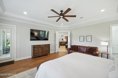 Nestled beneath a canopy of mature oak trees in the gated on Queens Harbour Yacht and Country Club in Florida - for sale on GolfHomes.com, golf home, golf lot