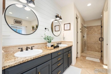 This two-story gem is a total showstopper! Located in the on Pelican Lakes Golf and Country Club in Colorado - for sale on GolfHomes.com, golf home, golf lot