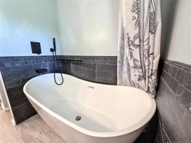 Welcome to this completely renovated 3-bedroom, 2-bathroom home on Pecan Valley Golf Course in Oklahoma - for sale on GolfHomes.com, golf home, golf lot